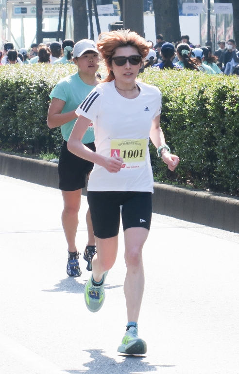 Japanese girls enjoy the running event, Shibuya-OmoteSando Womens Run 2026 on the OmoteSando in Shibuya Tokyo.