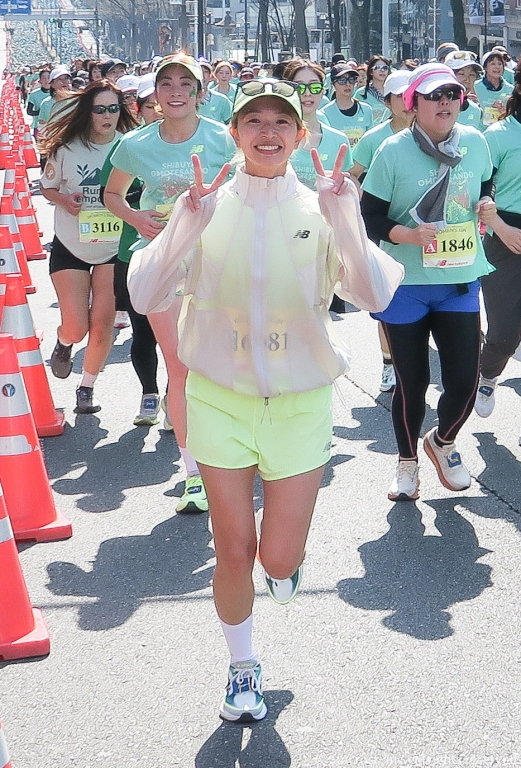 A Japanese girl enjoys the running event, at Shibuya-OmoteSando Womens Run 2026 #渋谷表参道ウィメンズラン in Shibuya Tokyo.